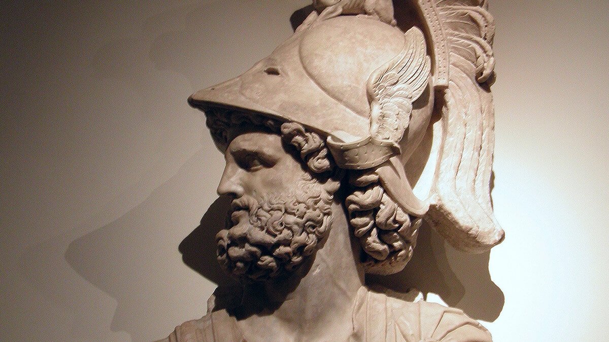 The statue of Roman god of war Mars (Ares). A close look of his head with a beard.